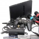 PlayStation 2 Konsole PS2 Black + SingStar Après-Ski Party (inkl. 2 Mikrofone) + 3 Spiele gebraucht